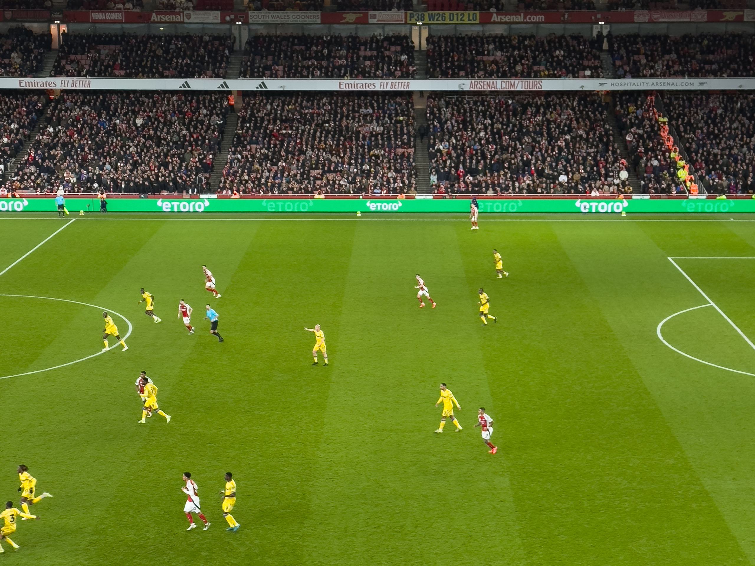 Soccer players in the UK playing a match.